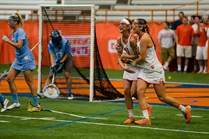 Kayla Treanor embraces Amy Cross after their win over North Carolina.