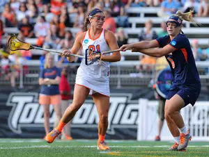 Attack Kayla Treanor fires a shot during Syracuse's 16-8 semifinal win against Virginia on Friday. The Orange faces Maryland Sunday night with the chance to become the first SU women's team to win a national championship.