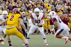 Terrel Hunt scans the Central Michigan defense on Saturday. Hunt ran for three touchdowns and threw for another score in his first full game of the season.