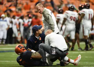 Terrel Hunt was tended to by trainers and SU head coach Scott Shafer after receiving a big hit in the fourth quarter of Syracuse's loss to Louisville on Friday. It was announced Monday that Hunt will miss 4-6 weeks with a fractured fibula. 