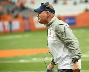 SU head coach Scott Shafer angrily reacts during the Orange's loss to Louisville on Friday night. Shafer took an emotional look at the loss during his postgame press conference.