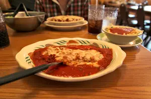 Angotti’s tasty veal parmigiana is covered in cheese and served with a side of spaghetti. The restaurant’s menu features Italian classics such as fresh pizza, gnocchi, lasagna and calzones. Most of the entrées did not cost more than $10.           jackie barr staff photographer
