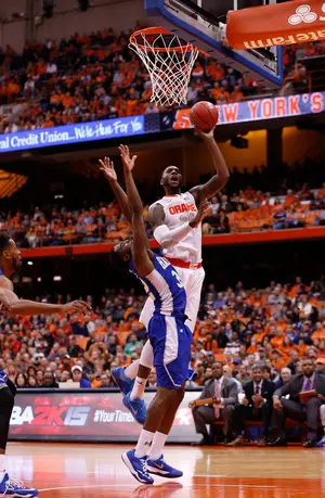 Rakeem Christmas powers up a left-handed shot in Syracuse's 65-47 win against Hampton in the Carrier Dome on Sunday evening. Christmas had a double-double with 15 points and 16 rebounds in an up-and-down SU victory.