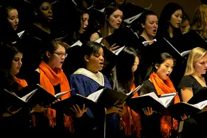 University Singers perform in Setnor Auditorium on Feb. 11 for the Choral Collage Concert. One of the songs the group sang was “Words” by Anders Edenroth, a staccato and upbeat English song. The 30 - 40 student choir will perform during the Veterans Day ceremony on Tuesday in Hendricks Chapel. 