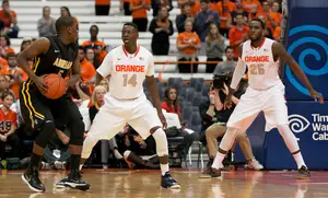 Kaleb Joseh (left) wasn't too aggressive in Syracuse's 84-35 win over Adrian on Monday night, and SU head coach Jim Boeheim wants him to change that moving forward. 