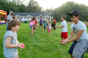 Children participate in activities organized by counselors at Camp Kesem, a national organization that provides free summer camp for children of cancer-diagnosed parents. Syracuse University students can apply to volunteer as camp counselors for the SU-affiliated program starting Monday.