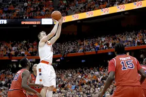 Trevor Cooney elevates for a jump shot during Saturday's loss. Syracuse shot just 3-for-23 from long range and Cooney went 0-for-4.