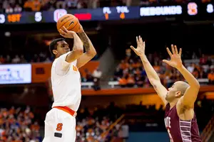Michael Gbinije scored in double figures for the fourth time in five games, and Syracuse routed Colgate on Monday in the Carrier Dome. 