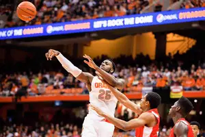 Forward Rakeem Christmas fires a pass during Syracuse's defeat of the Big Red on Wednesday. Christmas made sound decisions when Cornell double-teamed him and easily beat defenders when they tried him one-on-one.