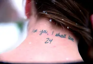 Samantha Steinert honors her 20-year-old cousin who passed away. Her tattoo represents his sports number, 24, and the words “For you I shall live” in memory of his life.