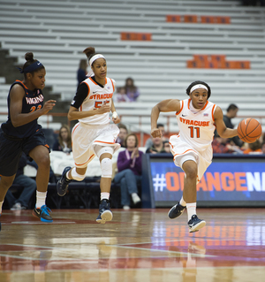 SU guard Cornelia Fondren (11) and forward Bria Day (55) and the Orange are 0-5 in games against ranked opponents this season, but have two chances to end the skid in the upcoming days. 