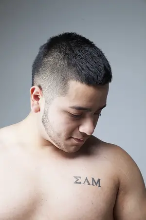 José Alvarez joined the fraternity Sigma Alpha Mu in last fall. He got the Greek letters tattooed on him five months later as a reminder of the strong brotherhood he formed. 