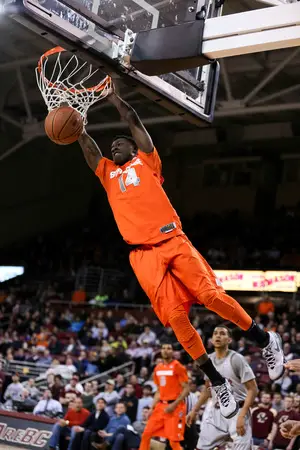 Syracuse point guard Kaleb Joseph flushes a two-handed slam, a product of his increased aggression, Wednesday night during the Orange's 70-56 victory over Boston College.