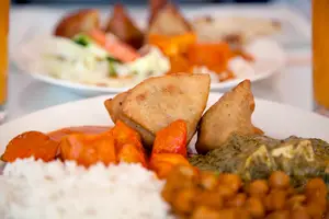 Samrat Indian Restaurant offers a large buffet that includes veggie samosas, tomato soup and several different curry based dishes. 