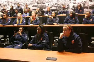 Syracuse players and coaches watched intently before the Orange was called on the ESPN Selection Monday broadcast. SU will play its third NCAA tournament in three years. 