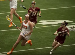 Kelly Cross has replaced her sister on Syracuse's first-line midfield, and will look to extend her nine-game point streak against Cornell on Tuesday.