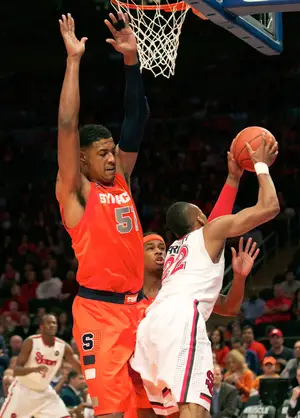Former Syracuse center Fab Melo first returned to action against St. John's on Feb. 4, 2012 after being academically ineligible for the previous three games. Though not explicitly identified in the NCAA's report Friday, the timeline of events surrounding 