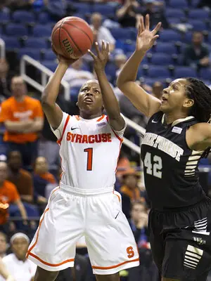 Syracuse guard Alexis Peterson shoots with Wake Forest forward Kandice Ball guarding during the second round of the ACC tournament on Thursday.