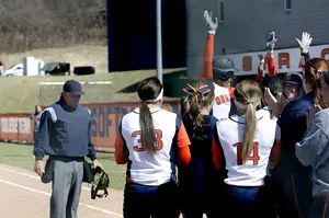 Syracuse celebrates a home during Wednesday's doubleheader. The Orange scored 11 runs in the first game and 13 in the second, outscoring Niagara 24-0 on the day.