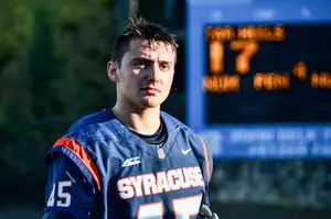 Randy Staats stands on the field following Syracuse's loss to North Carolina on Saturday. The senior assisted in three goals after returning from a lower body injury. 