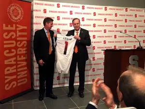 Mark Coyle was introduced by Kent Syverud on Monday as the new SU athletic director. He told The Daily Orange that he plans to speak with Floyd Little about the future of the No. 44