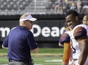 Scott Shafer will have to make a decision at the third linebacker spot, as the departures of Cameron Lynch (right) and Dyshawn Davis have left a vacancy.