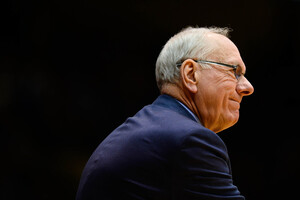 Syracuse University and Jim Boeheim settled the defamation lawsuit filed by Michael Lang and Bobby Davis
