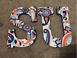 Etsy shop LettersByBronte sells intricately-painted letters and signs inspired by SU.