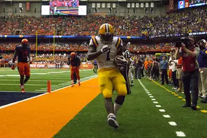 LSU running back Leonard Fournette scores his first touchdown against SU. Fournette racked up 244 yards and two touchdowns. 