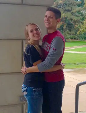 Amanda Nerem and Alec Norem hug for 31 hours straight, setting the Guinness World Record for the longest hug. Both attend Iowa State University.