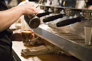 A barista at Cafe Kubal pours the perfect espresso.