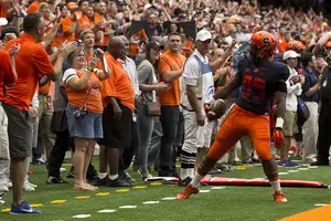 Syracuse tight end Josh Parris reacts to the Orange fans after making a catch against No. 8 Louisiana State on Sept. 26.