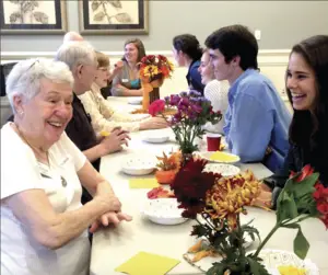Students at Furman University are participating in a program that matches them with an elderly person to connect with.