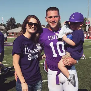 Sam Riddle (middle) has managed the duties of being a husband, father and quarterback for Division III Linfield College.