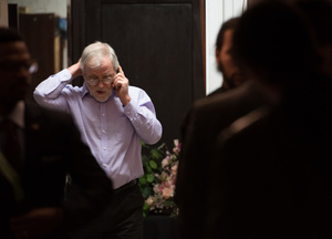 Howie Hawkins, who was defeated in his run for city auditor, speaks on the phone as he waits for early results to come in during an election result party at the Syracuse Polish Home. The Green Party had five candidates on the ballot and none were elected.