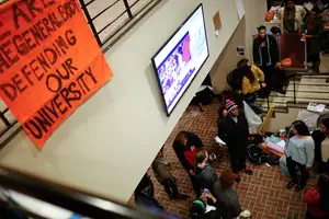 Syracuse University students in THE General Body protested against policies of the university's administration in an 18-day-long sit-in in Crouse-Hinds Hall in November 2014.