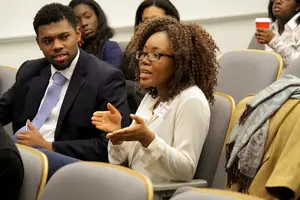 Rasheeda Davis, a senior in the S.I. Newhouse School of Public Communications, speaks during the “How to be a Professional and Blacktivist” session of the Blacktivism Conference, held Saturday. The event was put on by the SU chapter of the NAACP.