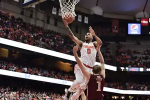 Michael Gbinije attacks the rim in Syracuse's 66-55 win over Elon on Saturday night in the Carrier Dome. It was a strategy that deviated from the past two games, but worked for SU against the Phoenix.