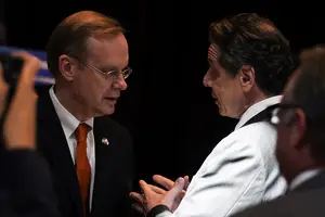 Gov. Andrew Cuomo and SU Chancellor Kent Syverud talk after an event in May. SU could be on the receiving end of some funding from the state through regional development funding.