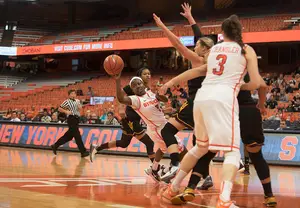 Alexis Peterson looks for a teammate in Syracuse's 61-54 loss to Arizona State on Saturday afternoon in the Carrier Dome. She finished with a game-high 15 points before leaving with a leg injury.