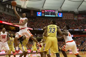 Malachi Richardson attacks the rim on Saturday against Georgia Tech. He also made two key free throws down the stretch to seal Syracuse's win.