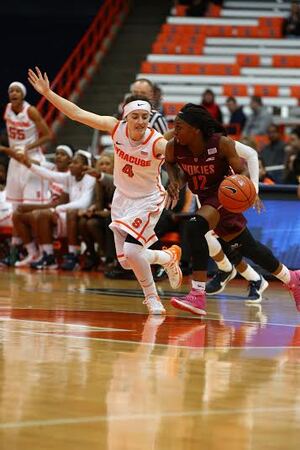 Maggie Morrison (4) and Syracuse suffocated Virginia Tech into turning the ball over 29 times on Sunday. The Orange romped the Hokies, 60-39. 