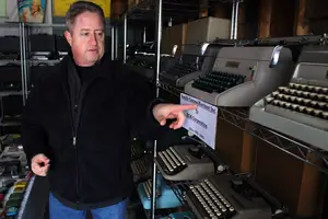 Syracuse local David Hawxhurst’s garage is filled with his keyboard collection.