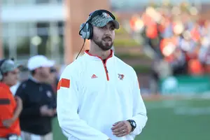 Sean Lewis will be Syracuse's new co-offensive coordinator and quarterbacks coach. His hiring, and five other assistants', was made official on Monday.