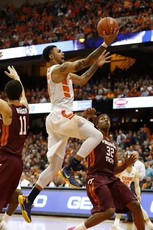 Michael Gbinije attacks the rim in Syracuse's 68-60 overtime win over Virginia Tech. The Orange took 32 foul shots, more than double the amount the Hokies attempted.