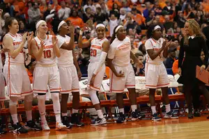 Syracuse players celebrate during the Orange's biggest win of the season against No. 10 Florida State on Thursday night.