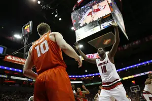 Trevor Cooney dropped in 19 points against Louisville on Wednesday in Syracuse's 72-58 loss on the road.