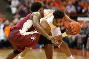 Malachi Richardson leans into a defender during Syracuse's last matchup with Florida State. The Orange could pad its NCAA Tournament resume with a win against the Seminoles. 