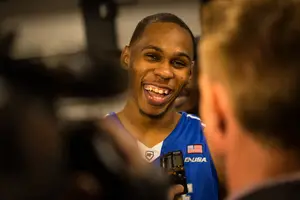 Jaqawn Raymond laughs in the locker room after Middle Tennessee pulled an incredible upset over No. 2 seed Michigan State. 