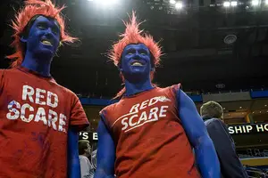 Two Dayton fans prior to tipoff for Syracuse-Dayton in the Round of 32 from 2014. St. Louis is the closest first-round site to Dayton and the Flyers may bring another big contingent on Friday.